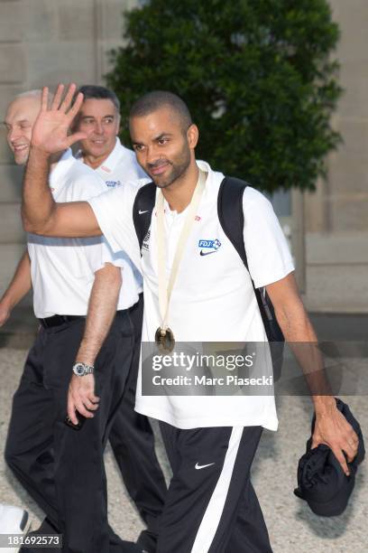 French basketball player Tony Parker waves as he enters the Elysee presidential palace on September 23, 2013 in Paris, France. France won the 2013...