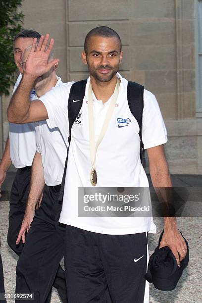 French basketball player Tony Parker waves as he enters the Elysee presidential palace on September 23, 2013 in Paris, France. France won the 2013...