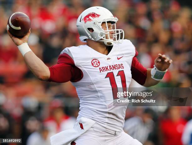 Quarterback AJ Derby of the Arkansas Razorbacks looks to pass against the Rutgers Scarlet Knights during the first half in a game at High Point...