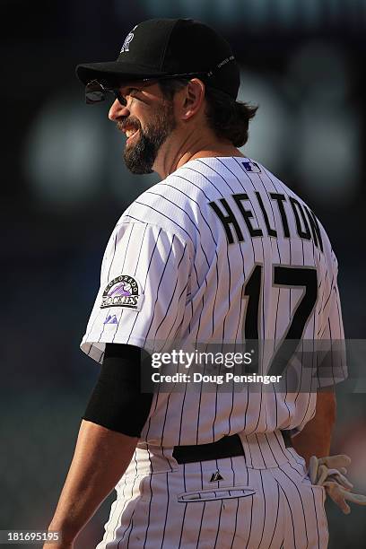 Todd Helton of the Colorado Rockies plays defense against the St. Louis Cardinals at Coors Field on September 19, 2013 in Denver, Colorado.