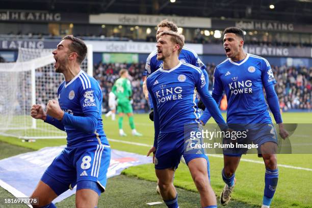 Kiernan Dewsbury-Hall of Leicester City celebrates with James Justin of Leicester City and Harry Winks of Leicester City after scoring to make it 0-1...