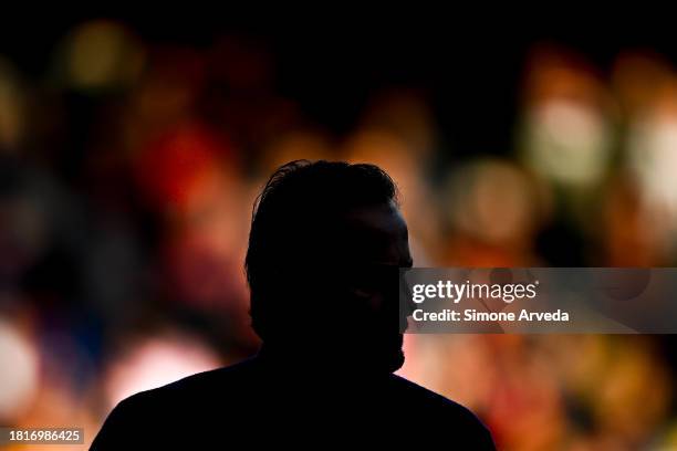 Alberto Gilardino, head coach of Genoa, is seen in silhouette as he enters the pitch prior to kick-off in the Serie A TIM match between Genoa CFC and...