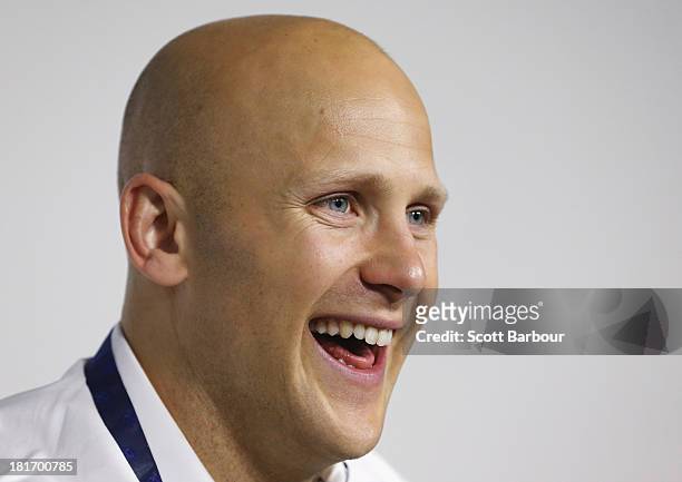 Gary Ablett Jnr of the Gold Coast laughs at AFL House on September 24, 2013 in Melbourne, Australia. Ablett won the 2013 AFL Brownlow medal last...