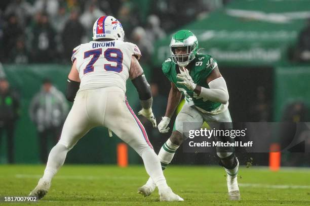 Josh Sweat of the Philadelphia Eagles rushes the passer against Spencer Brown of the Buffalo Bills at Lincoln Financial Field on November 26, 2023 in...