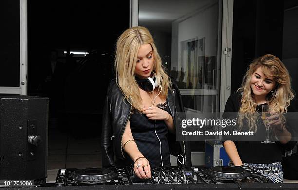 Laura Whitmore at the decks for the Macmillan De'Longhi Art Auction at Royal College of Art on September 23, 2013 in London, England.