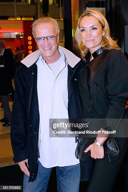 Actor Christophe Lambert and Christelle attend 'L'Escalier De Fer' with Laurent Gerra : Private Screening in Paris on September 23, 2013 in Paris,...