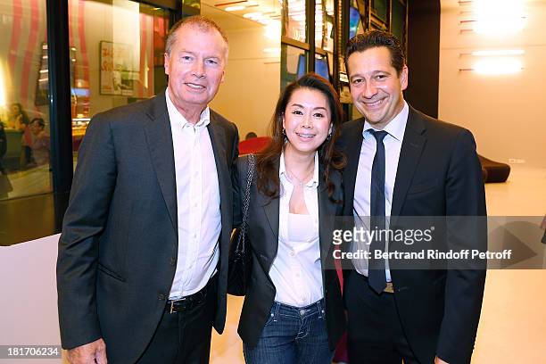Vice President of Samsung France Jacques Mollet with his companion Chino and actor of the movie Laurent Gerra attend 'L'Escalier De Fer' with Laurent...