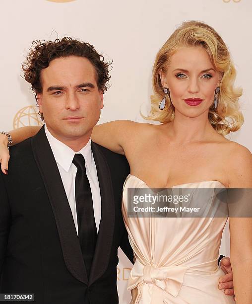 Actors Johnny Galecki; Kelli Garner arrive at the 65th Annual Primetime Emmy Awards at Nokia Theatre L.A. Live on September 22, 2013 in Los Angeles,...
