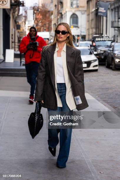 Margot Robbie is seen in SoHo on November 27, 2023 in New York City.