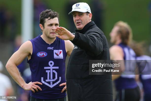 Dockers coach Ross Lyon talks with Hayden Ballantyne during an AFL Fremantle Dockers training session at Fremantle Oval on September 24, 2013 in...