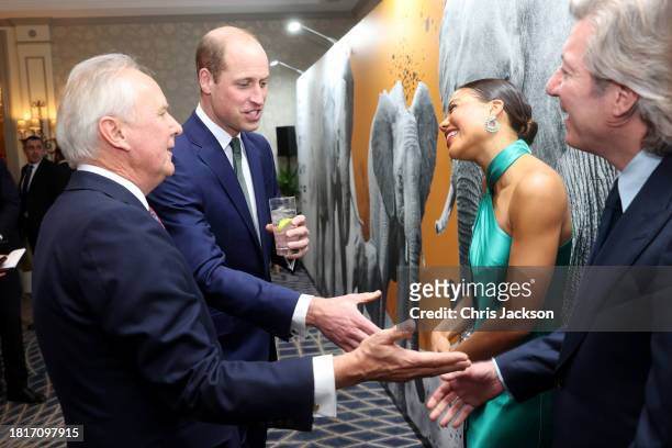 Founder and CEO of Tusk Trust Charlie Mayhew OBE and Prince William, Prince of Wales greet Marchioness of Bath Emma Weymouth and Ceawlin Thynn, 8th...