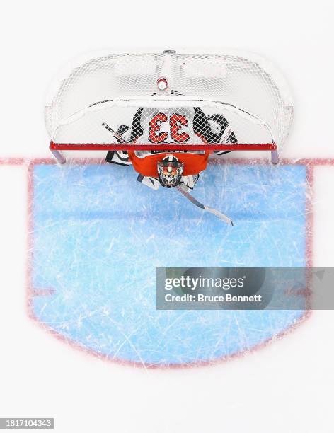 Samuel Ersson of the Philadelphia Flyers prepares to tends net against the New York Islanders at UBS Arena on November 25, 2023 in Elmont, New York.