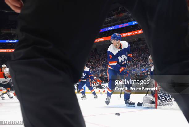 Noah Dobson of the New York Islanders skates against the Philadelphia Flyers at UBS Arena on November 25, 2023 in Elmont, New York.