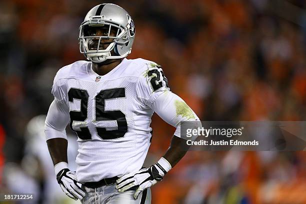 Cornerback DJ Hayden of the Oakland Raiders reacts after a Denver Broncos first down during the third quarter at Sports Authority Field Field at Mile...