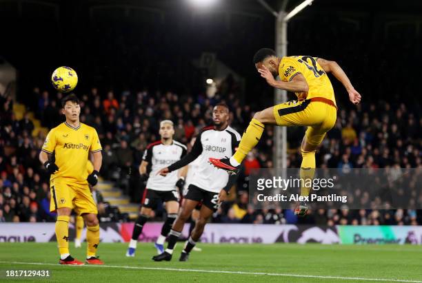 Matheus Cunha of Wolverhampton Wanderers scores the team's first goal during the Premier League match between Fulham FC and Wolverhampton Wanderers...