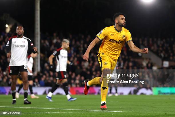 Matheus Cunha of Wolverhampton Wanderers celebrates after scoring the team's first goal during the Premier League match between Fulham FC and...