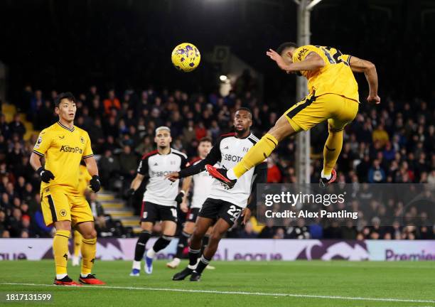 Matheus Cunha of Wolverhampton Wanderers scores the team's first goal during the Premier League match between Fulham FC and Wolverhampton Wanderers...