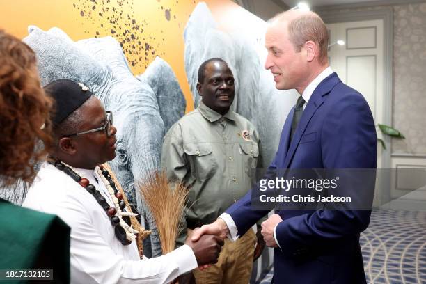 Prince William, Prince of Wales greets the Prince William Award Winner Dr Ekwoge Abwe and the Wildlife Ranger Award Winner Jealous Mpofu at the 2023...