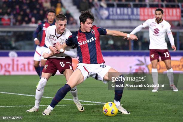 Ivan Ilic of Torino FC and Remo Freuler of Bologna FC battle for possession during the Serie A TIM match between Bologna FC and Torino FC at Stadio...