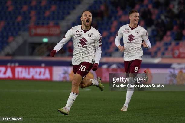 Nikola Vlasic of Torino FC celebrates after scoring before the goal was canceled during the Serie A TIM match between Bologna FC and Torino FC at...