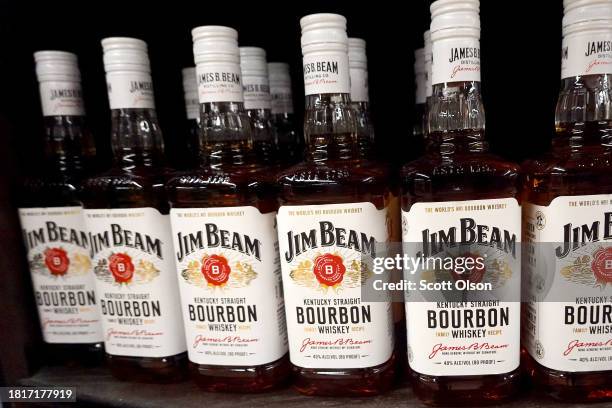 Bottles of the American whiskey Jim Beam are offered for sale in a liquor store on November 27, 2023 in Chicago, Illinois. American whiskey makers...