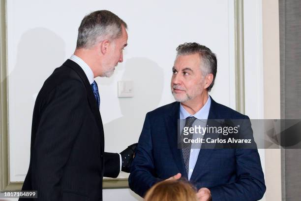Carlos Alsina recives from King Felipe VI of Spain the 40th "Francisco Cerecedo" Journalism Awards at the Palace Hotel on November 27, 2023 in...