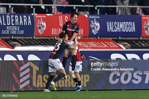 Giovanni Fabbian of Bologna FC celebrates with teammates after scoring the team's first goal during the Serie A TIM match between Bologna FC and...