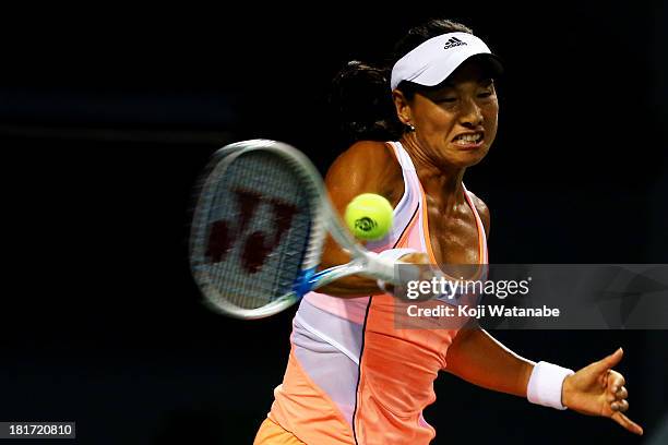 Kimiko Date-Krumm of Japan in action during her women's singles second round match against Samantha Stosur of Australia during day three of the Toray...