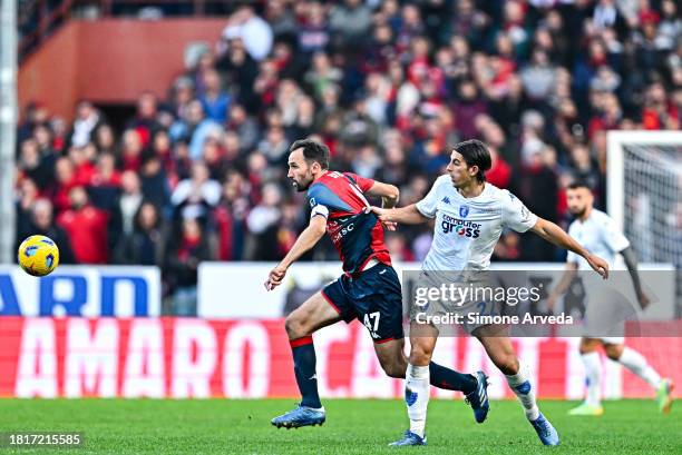 Milan Badelj of Genoa and Filippo Ranocchia of Empoli vie for the ball during the Serie A TIM match between Genoa CFC and Empoli FC at Stadio Luigi...