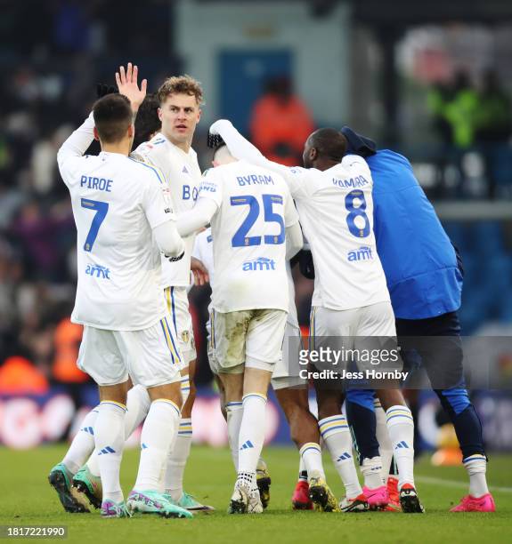 Crysencio Summerville of Leeds United celebrates with teammates after scoring the team's second goal during the Sky Bet Championship match between...