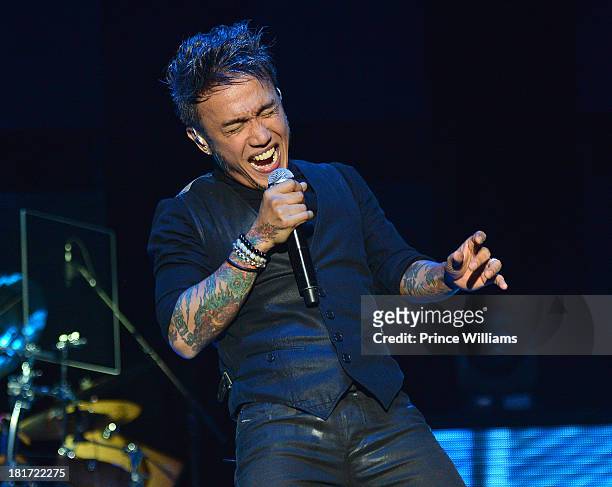 Arnel Pineda of Journey performs during Music Midtown 2013 - Day 1 at Piedmont Park on September 20, 2013 in Atlanta, Georgia.