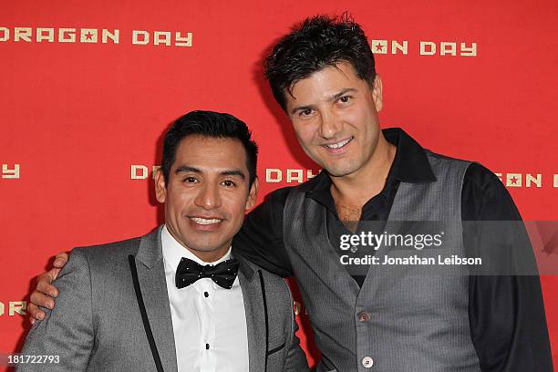 Eloy Mendez and Ethan Flower attend the "Dragon Day" Red Carpet at Downtown Independent Theatre on September 23, 2013 in Los Angeles, California.