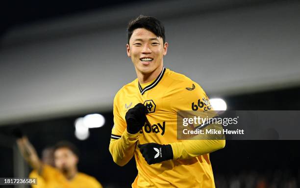 Hwang Hee-Chan of Wolverhampton Wanderers celebrates after scoring the team's second goal during the Premier League match between Fulham FC and...