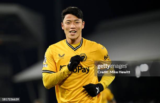 Hwang Hee-Chan of Wolverhampton Wanderers celebrates after scoring the team's second goal during the Premier League match between Fulham FC and...