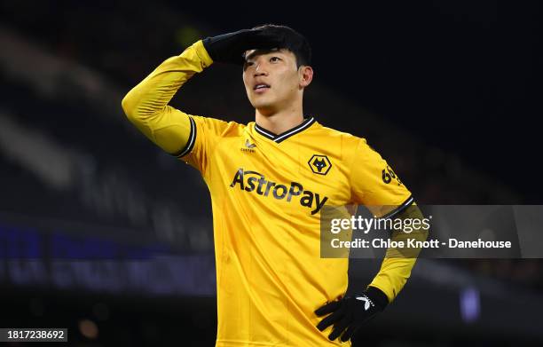 Hee Chan Hwang of Wolverhampton Wanderers celebrates scoring their teams second goal during the Premier League match between Fulham FC and...