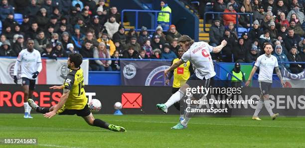 Bolton Wanderers's Jon Dadi Bodvarsson scores his team's first goal during the Emirates FA Cup 2nd Round match between Bolton Wanderers and Harrogate...