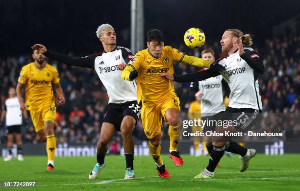 Tim Ream of Fulham FC fouls Hee Chan Hwang of Wolverhampton Wanderers resulting in a penalty for Wolverhampton Wanderers during the Premier League...