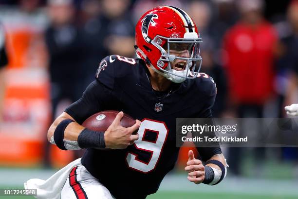 Desmond Ridder of the Atlanta Falcons scrambles during the fourth quarter against the New Orleans Saints at Mercedes-Benz Stadium on November 26,...
