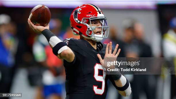 Desmond Ridder of the Atlanta Falcons looks to pass during the fourth quarter against the New Orleans Saints at Mercedes-Benz Stadium on November 26,...