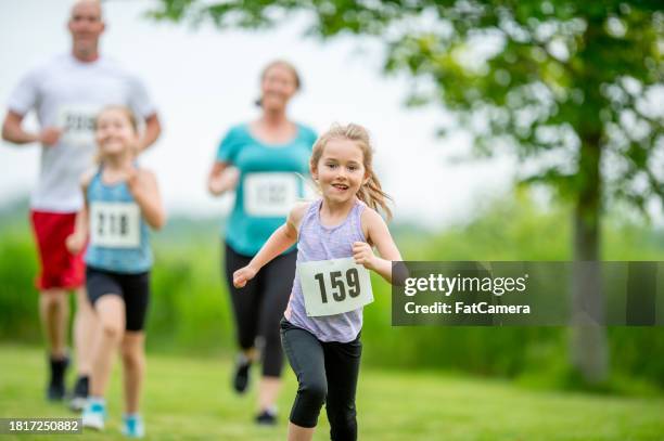 family race - kids track and field stock pictures, royalty-free photos & images