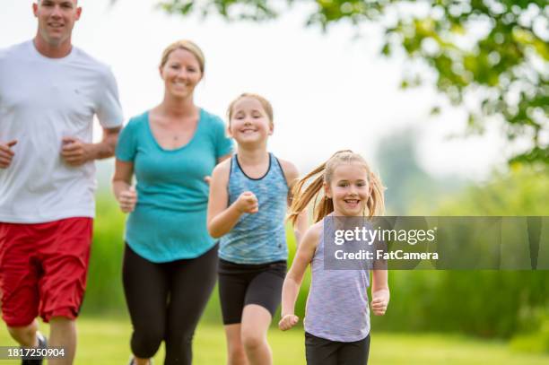 family run - dad press ups kids stock pictures, royalty-free photos & images