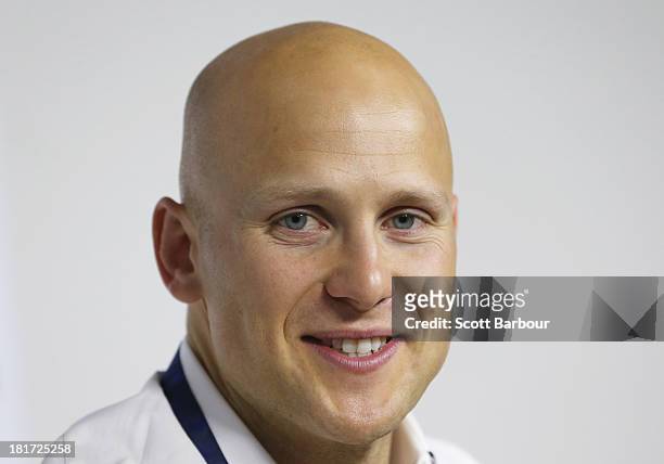 Gary Ablett Jnr of the Gold Coast poses with the Brownlow medal at AFL House on September 24, 2013 in Melbourne, Australia. Ablett won the 2013 AFL...
