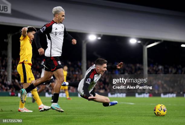 Harry Wilson of Fulham is fouled by Joao Gomes of Wolverhampton Wanderers, which results in a VAR Review resulting in a Penalty for Fulham, during...