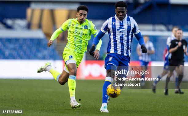 Blackburn Rovers' James Hill competing with Sheffield Wednesday's Di'Shon Bernard during the Sky Bet Championship match between Sheffield Wednesday...