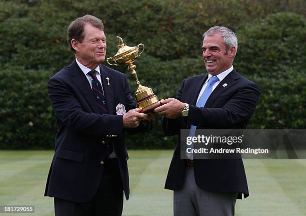 Tom Watson, the American Ryder Cup team captain, and Paul McGinley, the European Ryder Cup team captain, mess around with the trophy following The...