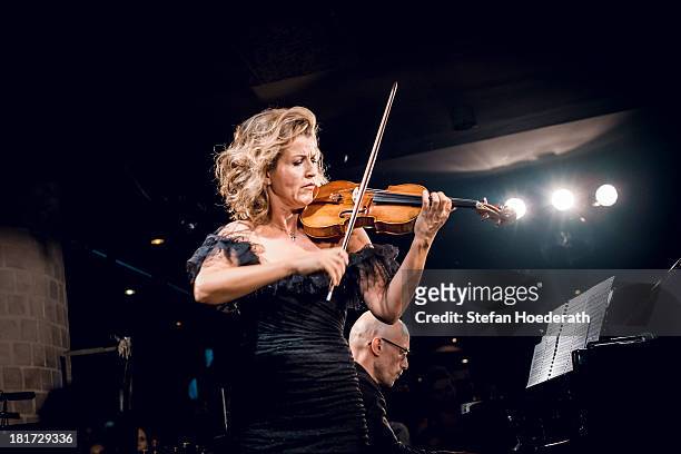 Violinist Anne-Sophie Mutter and Pianist Michael Abramovich perform live during a Yellow Lounge organized by recording label Deutsche Grammophon at...