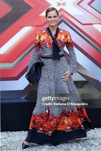 Simona Ventura attends X Factor 2013 Photocall at La Fonderia Napoleonica on September 24, 2013 in Milan, Italy.