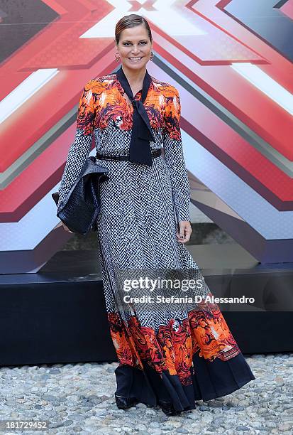 Simona Ventura attends X Factor 2013 Photocall at La Fonderia Napoleonica on September 24, 2013 in Milan, Italy.