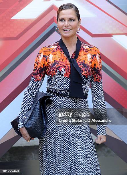 Simona Ventura attends X Factor 2013 Photocall at La Fonderia Napoleonica on September 24, 2013 in Milan, Italy.