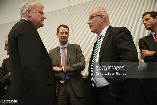 Volker Kauder , head of the Bundestag faction of the German Christian Democrats chats with Horst Seehofer , Chairman of the Bavarian Christian...